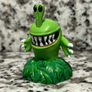 Figure of a Chompy figure, one of the most common enemies found in the skylander series. The Chompy is one of the green variants