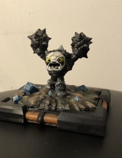 A Recreation of the skylander Fist Bump, made using 3D printing. Figure uses my now defunct base style meant to fit Writable NFC cards