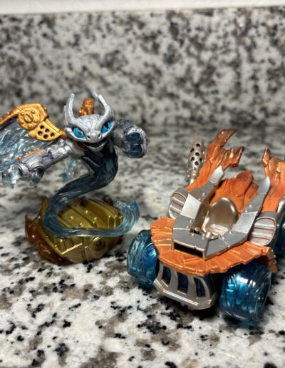 A repainted Spitfire figure with their accompanying vehicle. Figure is painted as an instant variant.