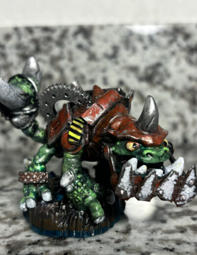 A custom repaint of Slobbertooth from skylanders. Figure has kitbashed elements to modify the figure