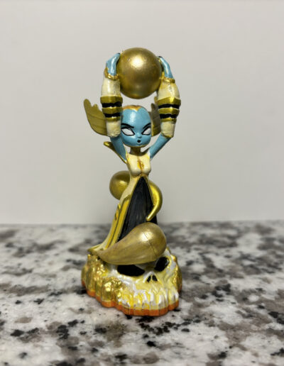 A repaint of series 2 Hex from skylanders, converted into her element changed ring of heroes variant.