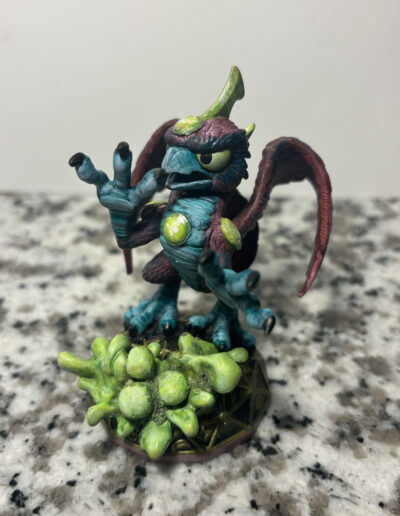 A custom of sunburn from skylanders, swapped onto a magic element base and repainted accordingly.