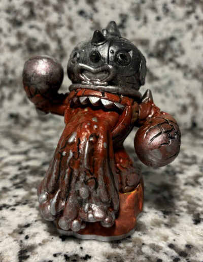 A repaint of a series 3 Eruptor figure, Kitbashed to resemble molten metal.