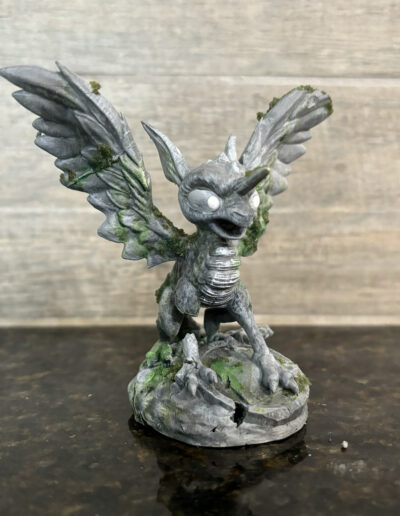 A stone variant of Debug minion, a tester character found in early skylander games that uses the whirlwind character model.
